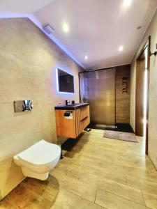 Phòng tắm tại Apartmánový dom LÚČNA