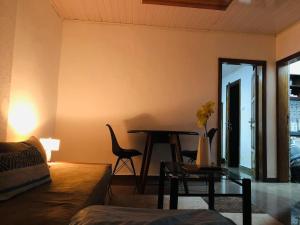 Posezení v ubytování Mac immobilier