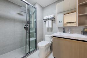 Koupelna v ubytování 枫雨酒店公寓华强北店-Fengyu Hotel Apartment Shenzhen Huaqiang North Subway Station Branch
