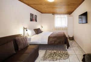 Postel nebo postele na pokoji v ubytování Oiti Mountain Apartments