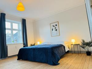 Postel nebo postele na pokoji v ubytování aday - Beautiful and Spacious 4 bedroom - Heart of Aalborg