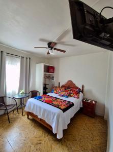 Postel nebo postele na pokoji v ubytování Hotel Catalina