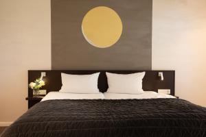 Postel nebo postele na pokoji v ubytování Hotel Vulcano Lindenhof