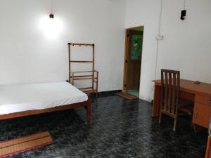 Ένα ή περισσότερα κρεβάτια σε δωμάτιο στο Inuli Coco Hut