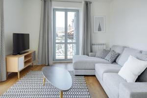 Posezení v ubytování H SUITE3A by Smiling Rentals