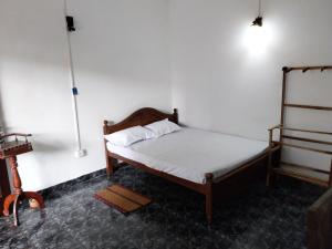 Ένα ή περισσότερα κρεβάτια σε δωμάτιο στο Inuli Coco Hut