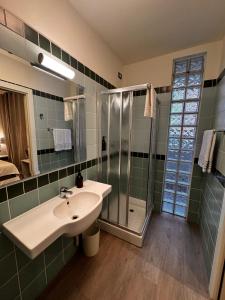 Koupelna v ubytování Confidence Hotel Parma