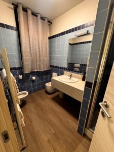 Koupelna v ubytování Confidence Hotel Parma