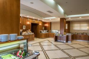 Kuchyň nebo kuchyňský kout v ubytování Cretan Dream Resort & Spa
