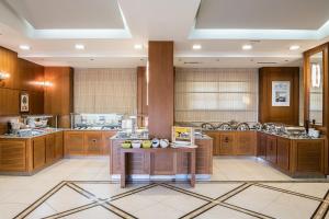 Kuchyň nebo kuchyňský kout v ubytování Cretan Dream Resort & Spa