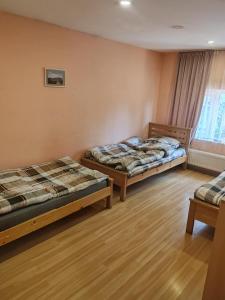 Voodi või voodid majutusasutuse Galaxy Hostel toas