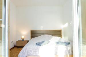 Postel nebo postele na pokoji v ubytování Pool House Paun