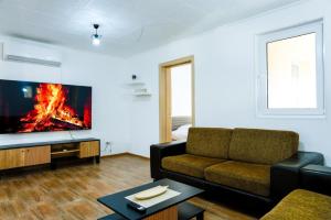 TV a/nebo společenská místnost v ubytování Pool House Paun