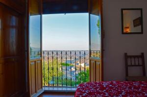 Ένα ή περισσότερα κρεβάτια σε δωμάτιο στο Casa Número 2 +31 φωτογραφίες