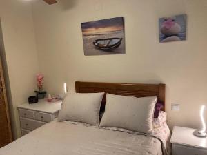 A bed or beds in a room at Águilas Playa