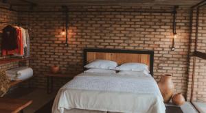 Ein Bett oder Betten in einem Zimmer der Unterkunft Monte Sião Château