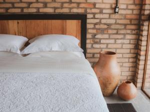Ein Bett oder Betten in einem Zimmer der Unterkunft Monte Sião Château