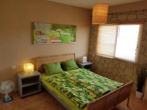 Postel nebo postele na pokoji v ubytování Villa Roque Del Conde 3Mit Traumhaftem Meerblick