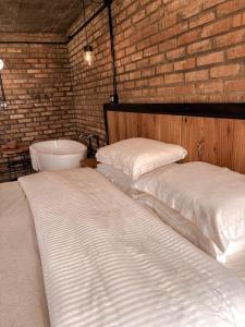 Ein Bett oder Betten in einem Zimmer der Unterkunft Monte Sião Château