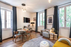 TV a/nebo společenská místnost v ubytování Les Maisons d Anthony Marseille
