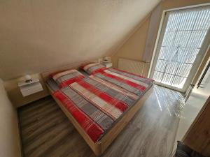 Katil atau katil-katil dalam bilik di Komfortable Ferienwohnung In Werdum +6 gambar