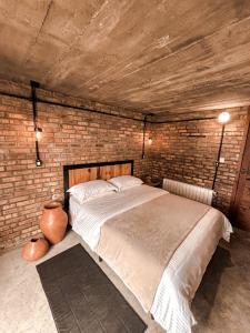 Ein Bett oder Betten in einem Zimmer der Unterkunft Monte Sião Château