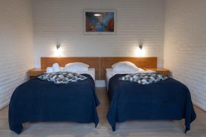 Voodi või voodid majutusasutuse Hotel Lisboa toas