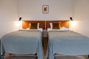Voodi või voodid majutusasutuse Hotel Lisboa toas