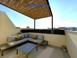 En balkon eller terrasse på House&Villas - Casa Lumae