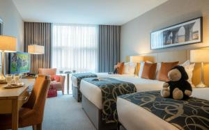 Ліжко або ліжка в номері Clayton Hotel Limerick