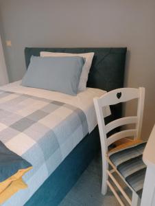 Postel nebo postele na pokoji v ubytování B&B Cascina Ciapilau + 18 fotografií
