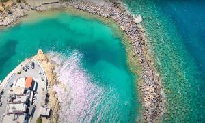 an aerial view of a boat in a body of water at Ferienhaus Für 10 Personen In Kalo Chorio, Kreta Ost Kreta in Pírgos +23 photos