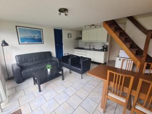 Kuchyň nebo kuchyňský kout v ubytování Bungalowpark Simpelveld - Delta 109