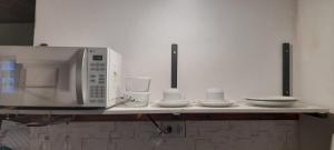 Kuchyň nebo kuchyňský kout v ubytování Chalé Bonito Pousada em Paraty - Acomodações Privativas e Completas - Natureza - Wi-fi - TV - Garagem