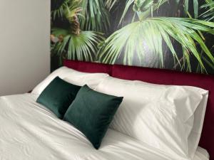 Postel nebo postele na pokoji v ubytování Maison Gucci