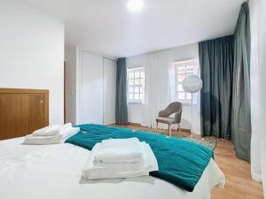 Postel nebo postele na pokoji v ubytování Charming Apartment in Chaves