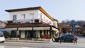 a car parked in front of a building at ALO ALO ALBERGO in Casteggio
