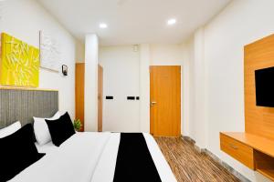 Postel nebo postele na pokoji v ubytování Super Hotel O Indriya