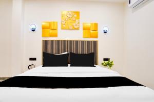Postel nebo postele na pokoji v ubytování Super Hotel O Indriya