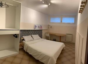 Ένα ή περισσότερα κρεβάτια σε δωμάτιο στο La Casa 44 +32 φωτογραφίες