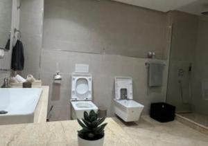 Koupelna v ubytování Appartement luxueux vue mer + 37 fotografií