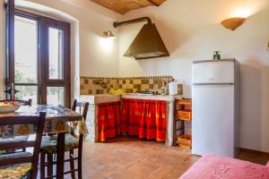 O bucătărie sau chicinetă la Le Gerlette - Il Granaio