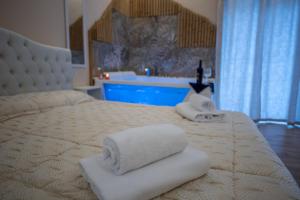 Postel nebo postele na pokoji v ubytování Perla Di Mare