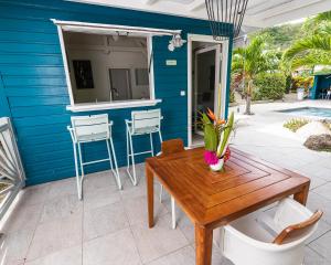 Balkón nebo terasa v ubytování Mon'Désir Lodge - Bungalows
