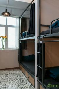 Postel nebo postele na pokoji v ubytování Sapa Signature Inn