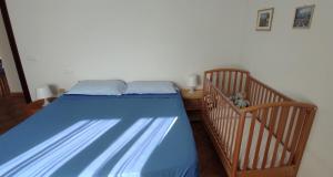 Ένα ή περισσότερα κρεβάτια σε δωμάτιο στο Casa Leonardo close to the beach