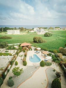 an aerial view of a resort with a swimming pool at Gennadi Dreams Ferienvilla in Gennadi