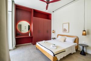 Ένα ή περισσότερα κρεβάτια σε δωμάτιο στο Marianna Suites