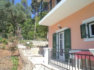 A garden outside Nikolas Apartments Kalami bay