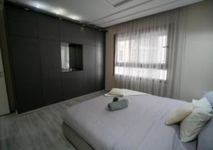 Postel nebo postele na pokoji v ubytování Appartement luxueux vue mer